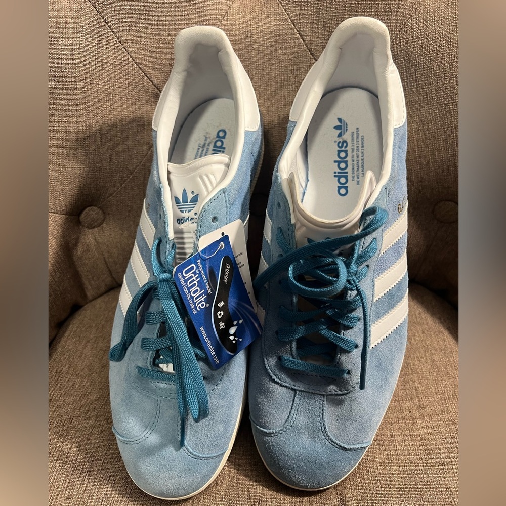 Adidas men’s gazelle sneaker. New with tags. Baby blue with white stripe.